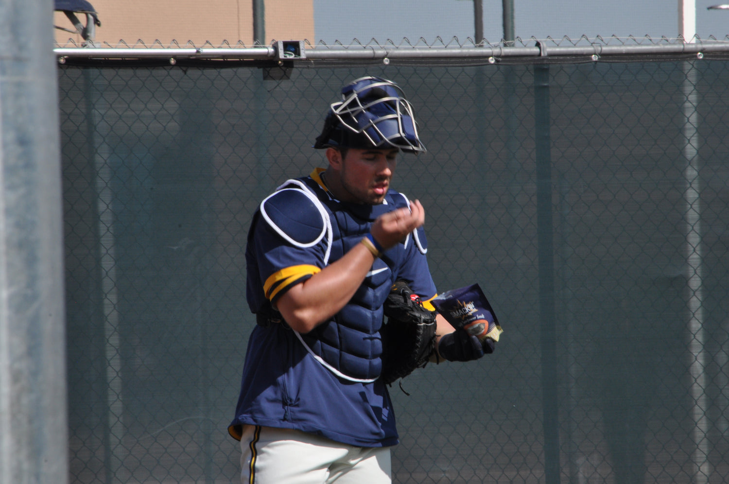 Payton Henry packing a cheek of sunflower seeds