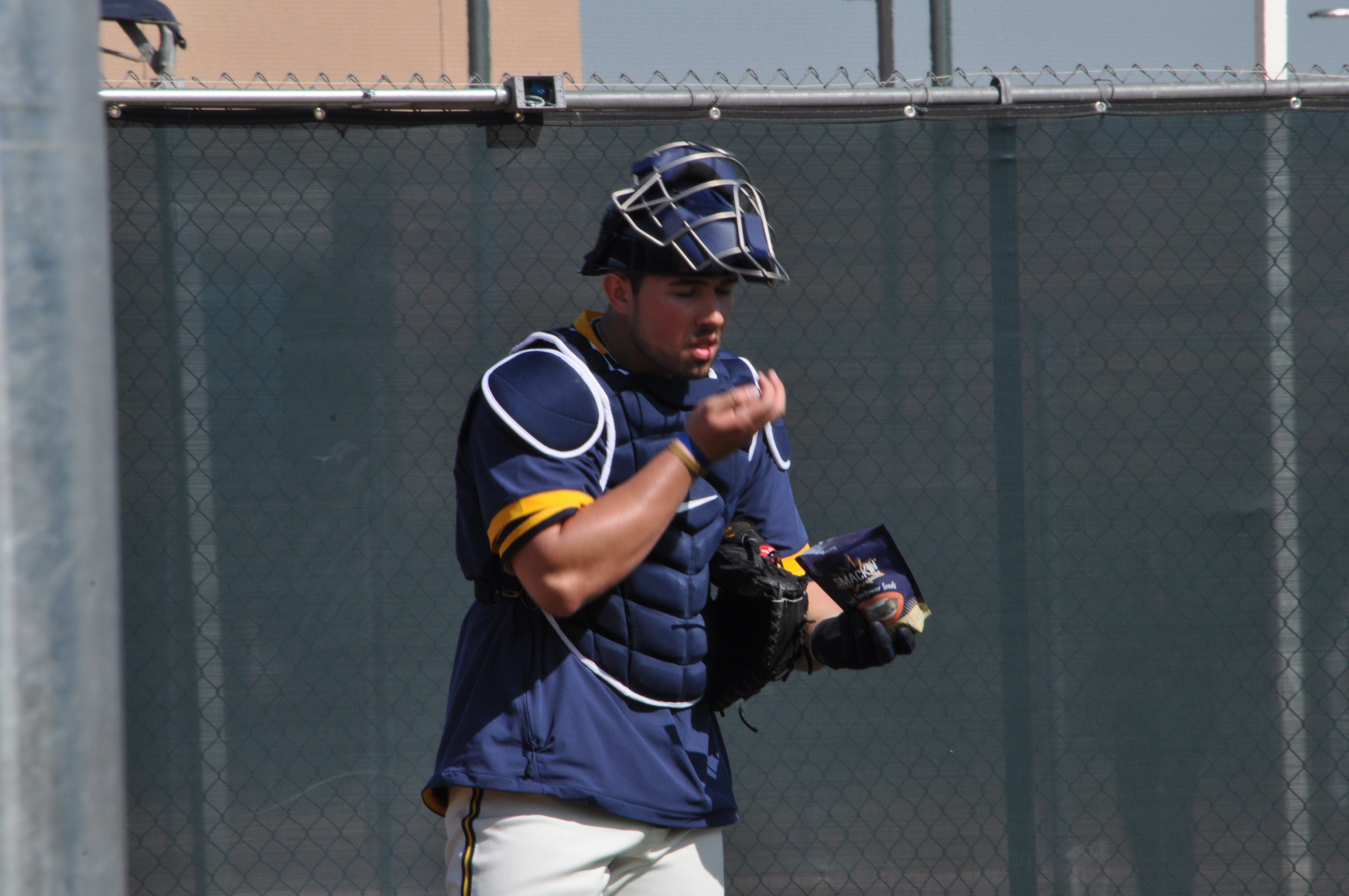 Payton Henry packing a cheek of sunflower seeds