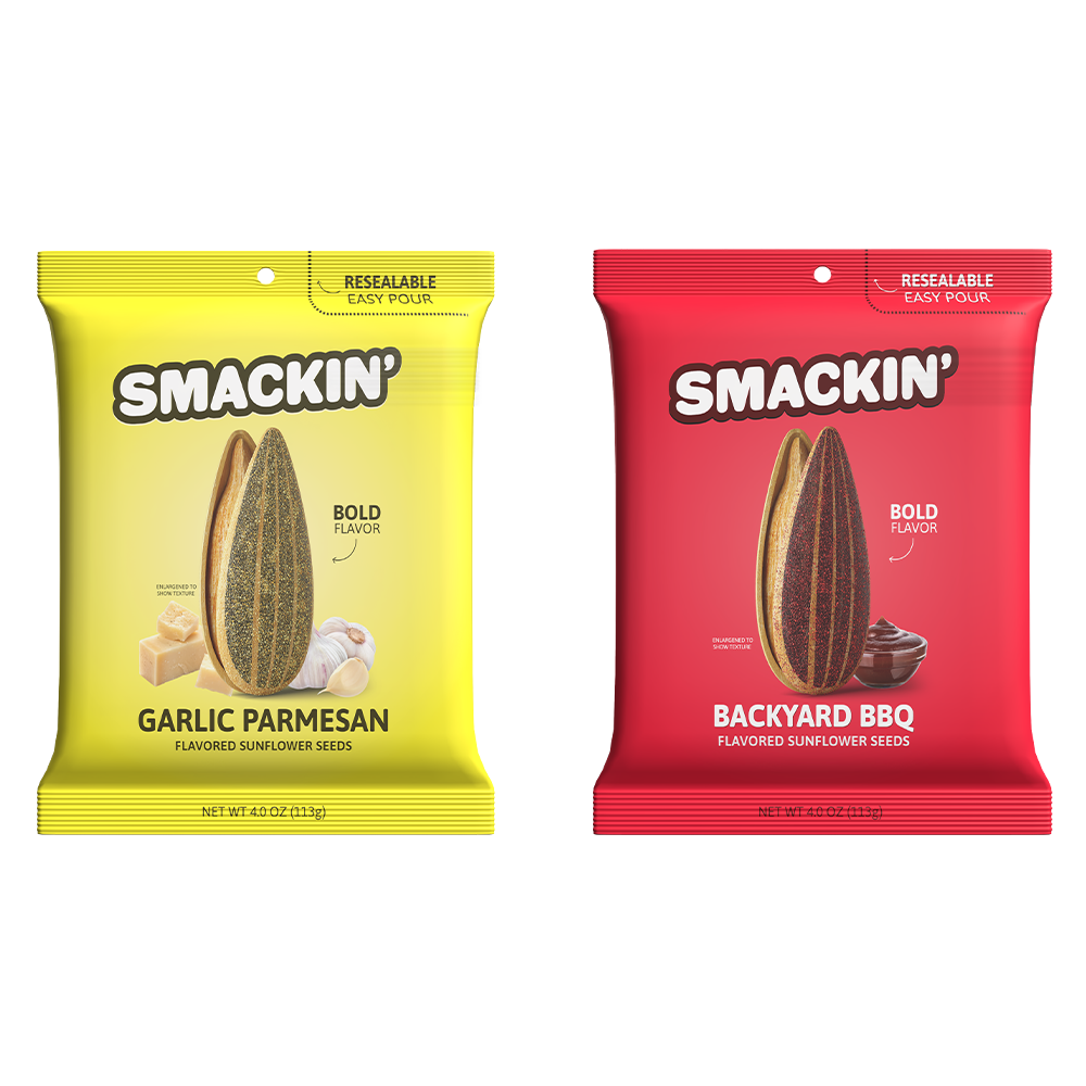 Two Smackin' flavored sunflower seed bags on a white background, a yellow Garlic Parmesan bag showing a large seed with cheese and garlic, and a red Backyard BBQ bag showing a large seed with a bowl of sauce, both featuring a resealable easy-pour top