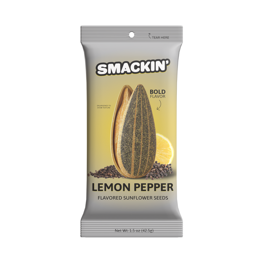 Product photography of Smackin' Lemon Pepper Flavored Sunflower Seeds bag featuring an enlarged seasoned sunflower seed, a bright yellow lemon slice, and scattered black peppercorns against a gradient yellow background