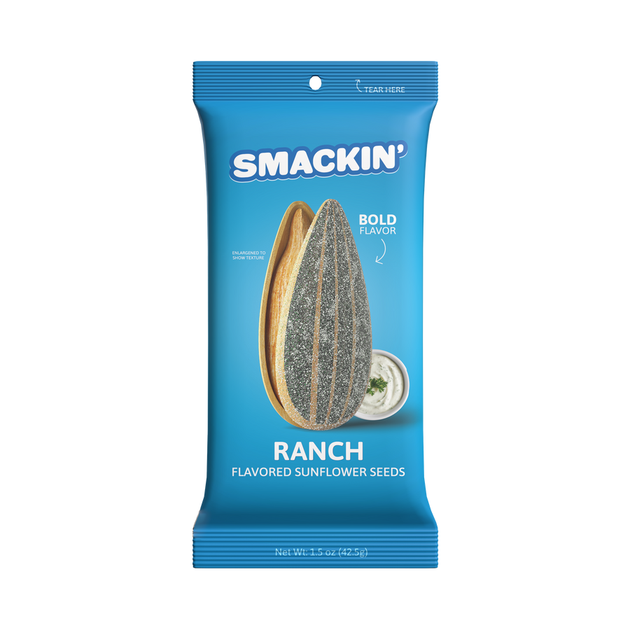 Product image of Smackin' Ranch Flavored Sunflower Seeds, a vibrant blue pouch featuring an enlarged graphic of a split sunflower seed with textured gray shell and golden kernel, alongside a small white bowl of ranch dressing with parsley and "BOLD FLAVOR" text