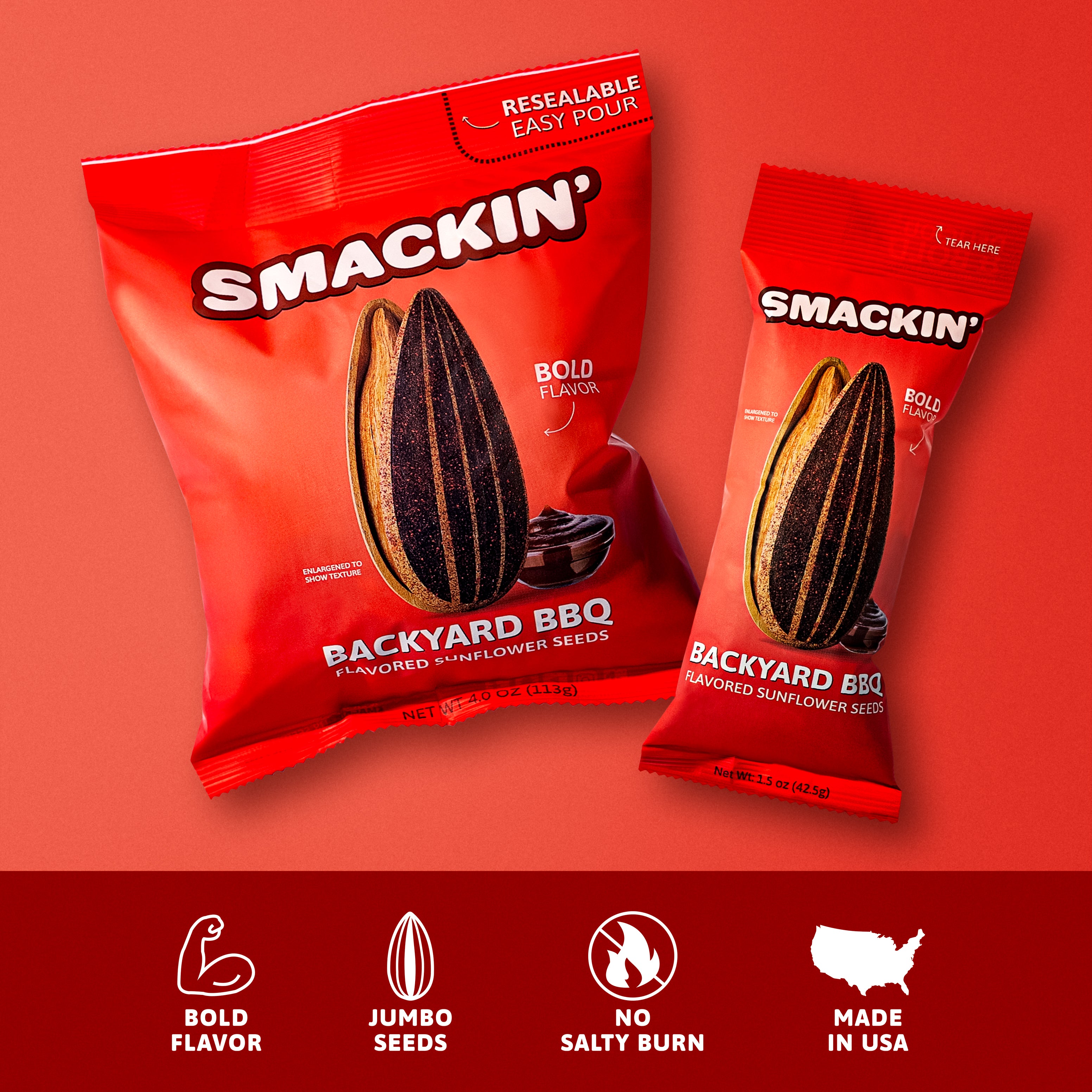 Digital photograph of two red Smackin' Backyard BBQ flavored sunflower seed bags, one 4.0 oz and one 1.5 oz, featuring enlarged black-striped seeds and a dollop of BBQ sauce, highlighted with Resealable Easy Pour and a Made in USA icon on a vibrant red background