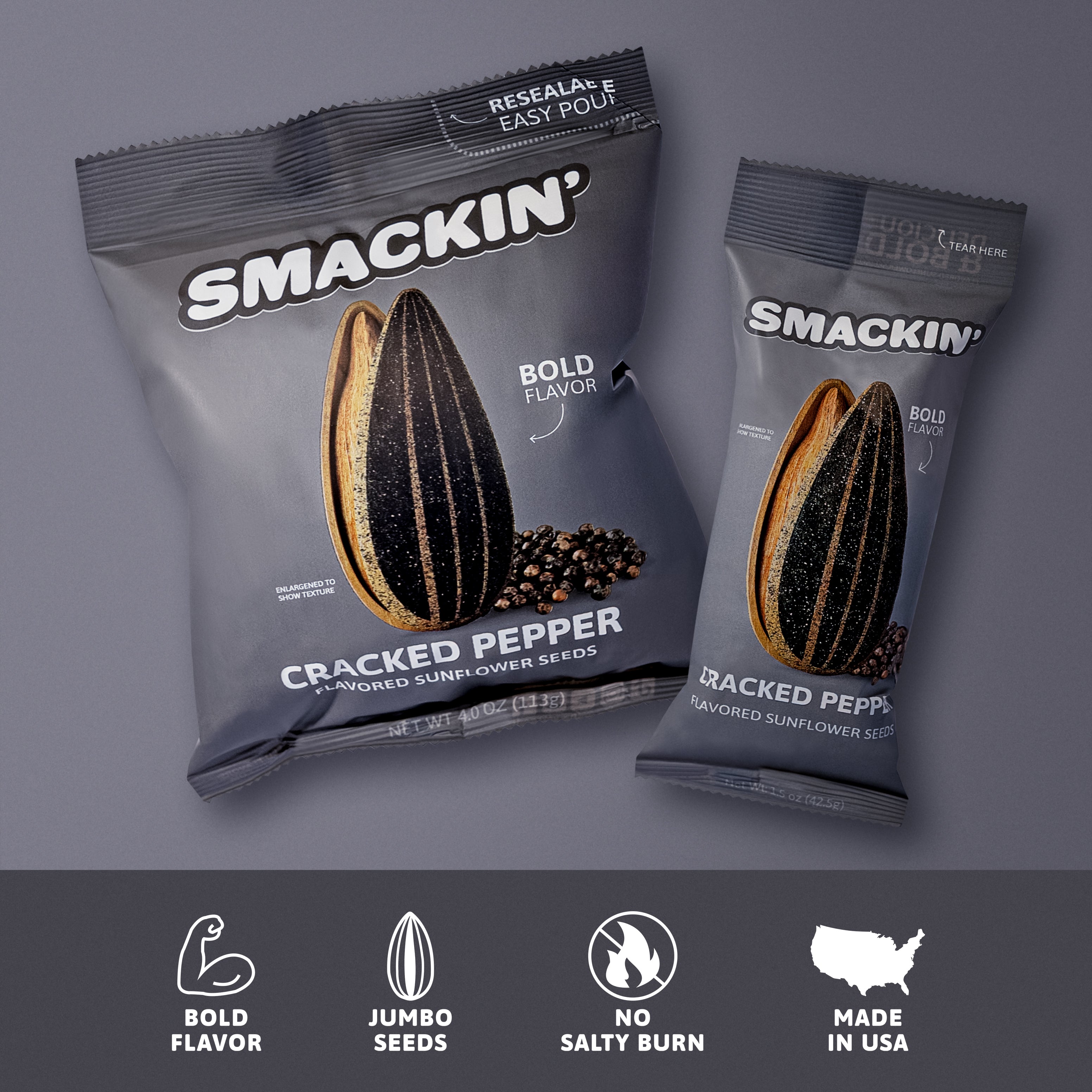 Two gray Smackin' Cracked Pepper flavored sunflower seed bags, displaying an enlarged peppered sunflower seed graphic, "Bold Flavor" branding, a resealable top, and bottom icons indicating Jumbo Seeds and Made in USA