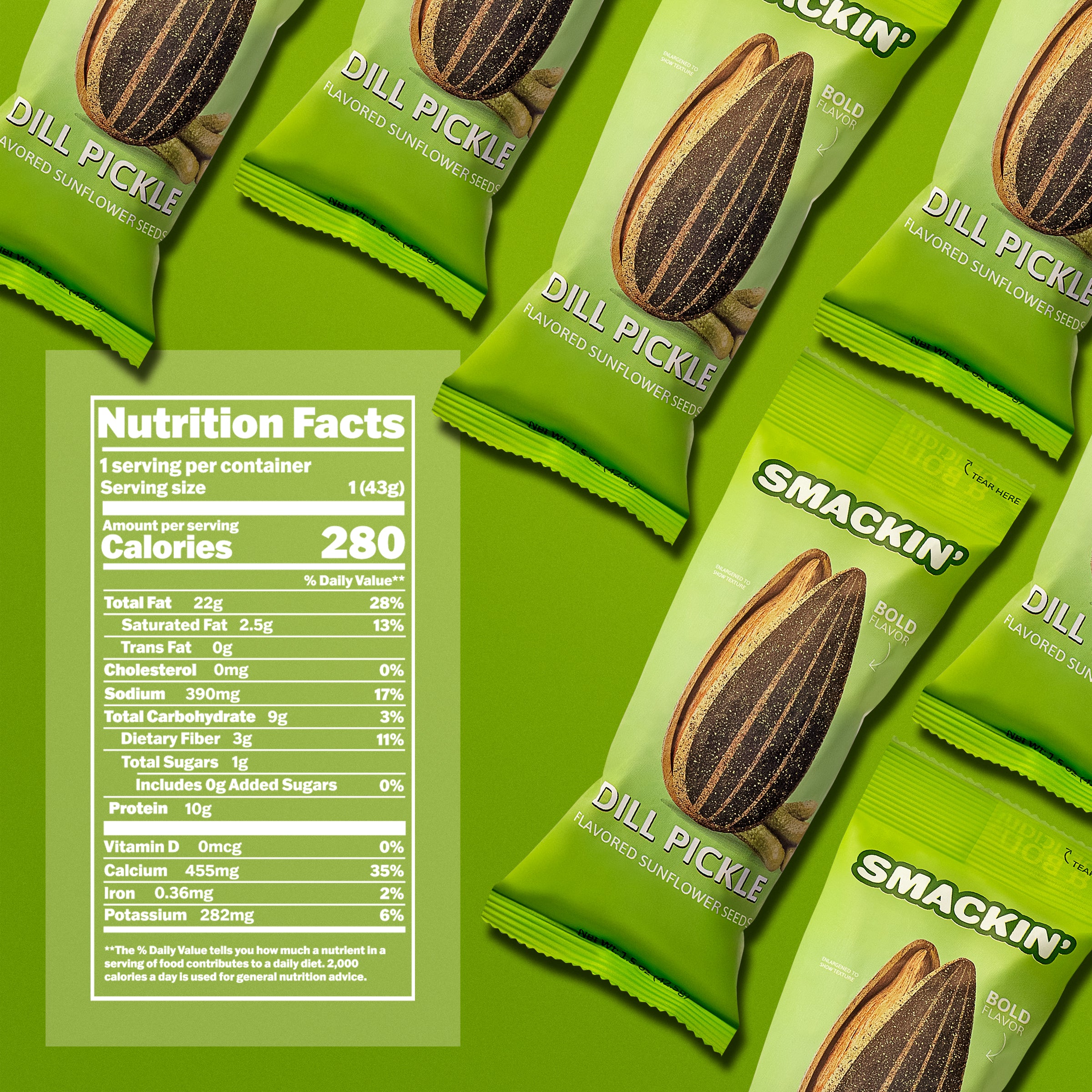 Product photography featuring several bright lime green Smakin' Dill Pickle flavored sunflower seed bags on a vibrant green background, showcasing a large sunflower seed graphic, cartoon pickle illustrations, and a white nutrition facts label with 280 calories