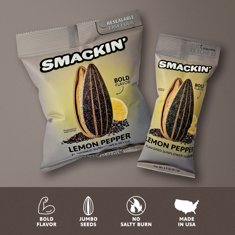 Product photography of two different-sized Smackin' Lemon Pepper Flavored Sunflower Seeds bags, showcasing a large sunflower seed, a bright lemon slice, black peppercorns, and the resealable easy pour feature on the larger bag, with icons highlighting bold flavor, jumbo seeds, and Made in USA