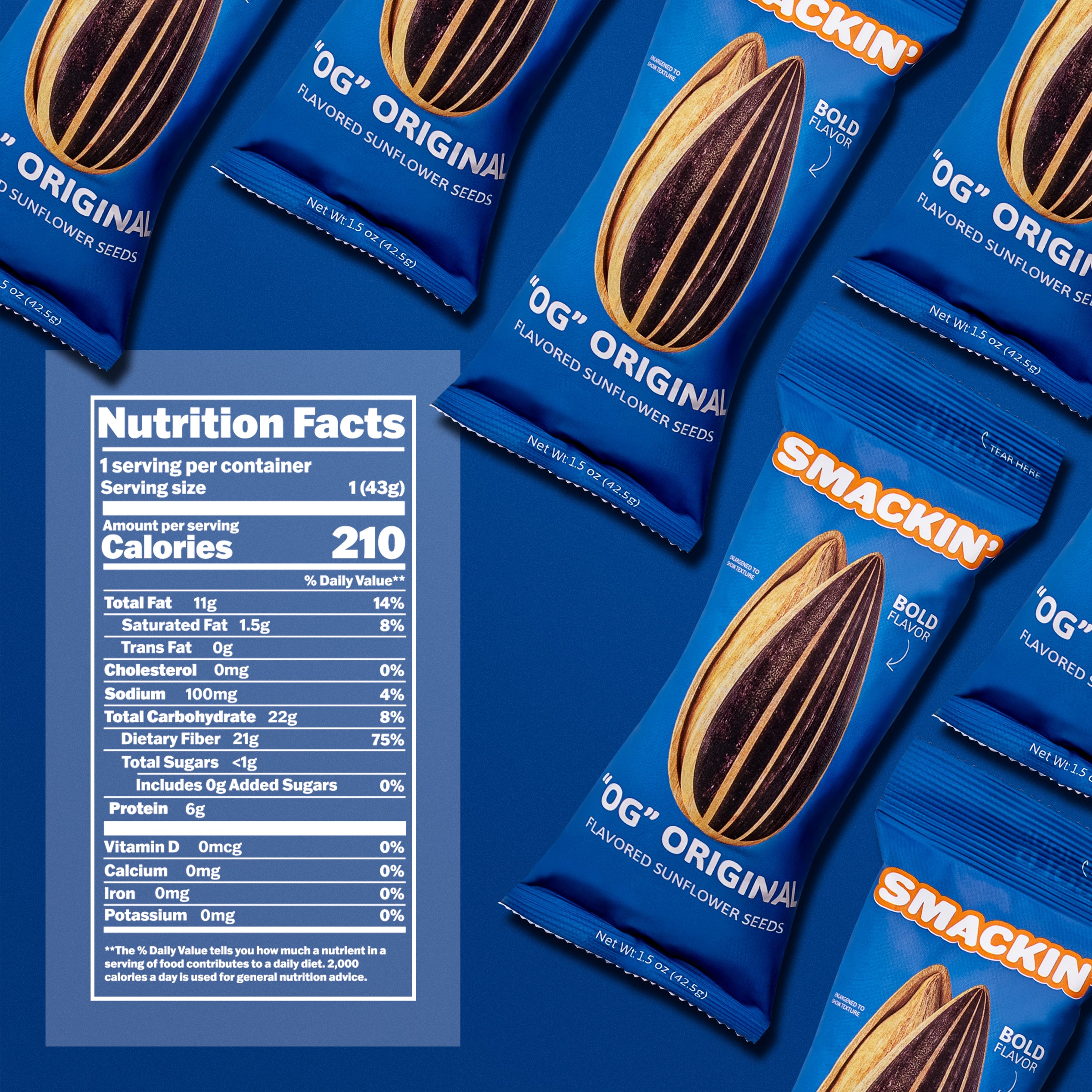 Product photography featuring multiple vibrant blue Smackin' 'OG' Original Flavored Sunflower Seed packets laid out on a matching blue background, each displaying a detailed striped sunflower seed illustration, bold orange 'SMACKIN' branding, and a clear white Nutrition Facts label on the left