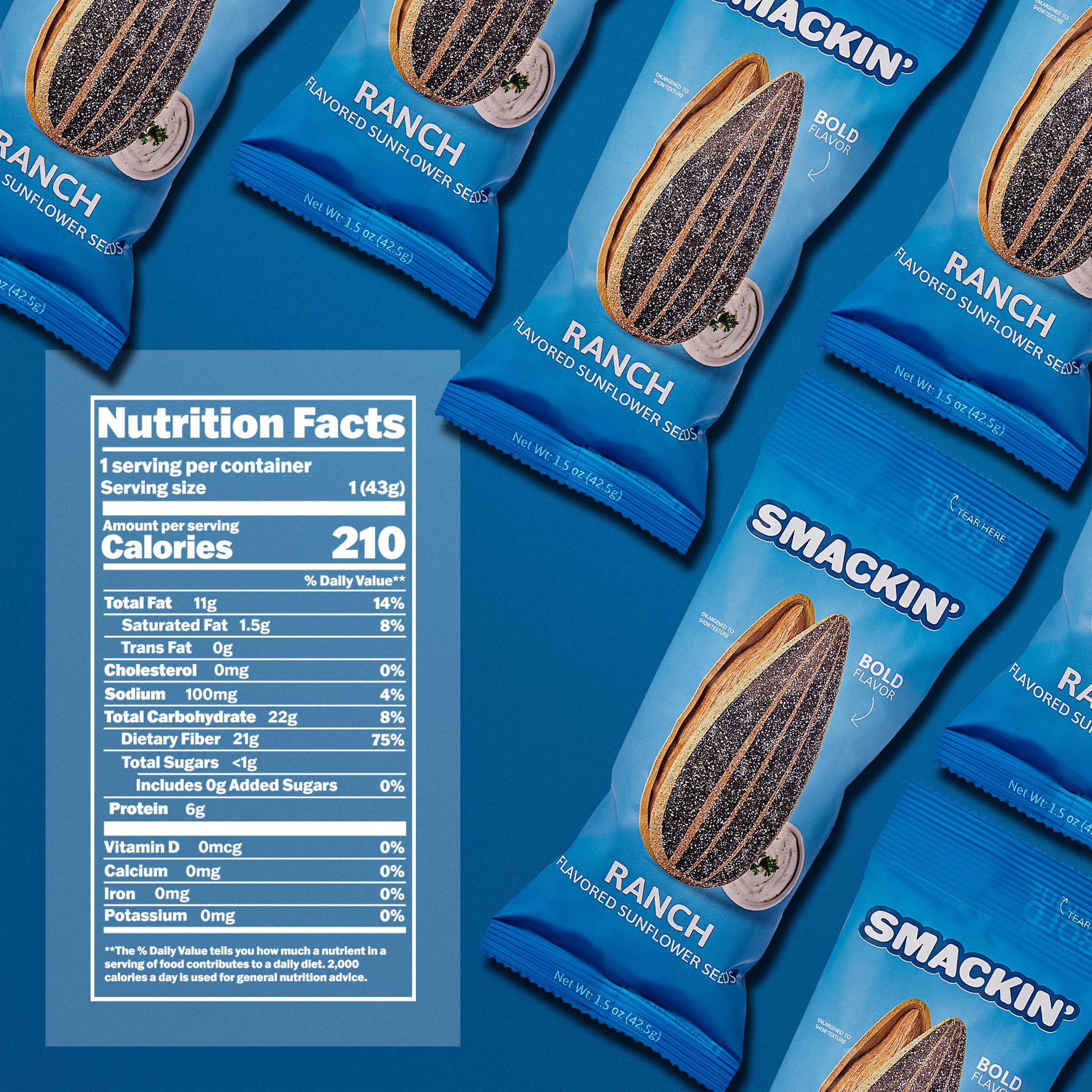 Studio shot of several vibrant blue packages of Smackin' Ranch Flavored Sunflower Seeds featuring a bold sunflower seed graphic and a small bowl of ranch dip, with a detailed white Nutrition Facts label showing 210 calories prominently on the left
