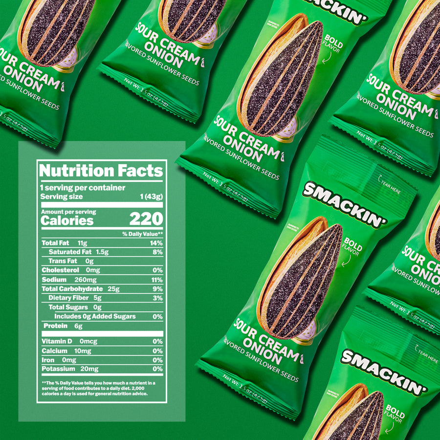 Multiple vibrant green Smackin' Sour Cream & Onion flavored sunflower seeds snack bags are displayed on a matching green background, each featuring a textured graphic of an unshelled sunflower seed and 'Bold Flavor' messaging, alongside a detailed Nutrition Facts label on the left indicating 220 calories and 6g protein