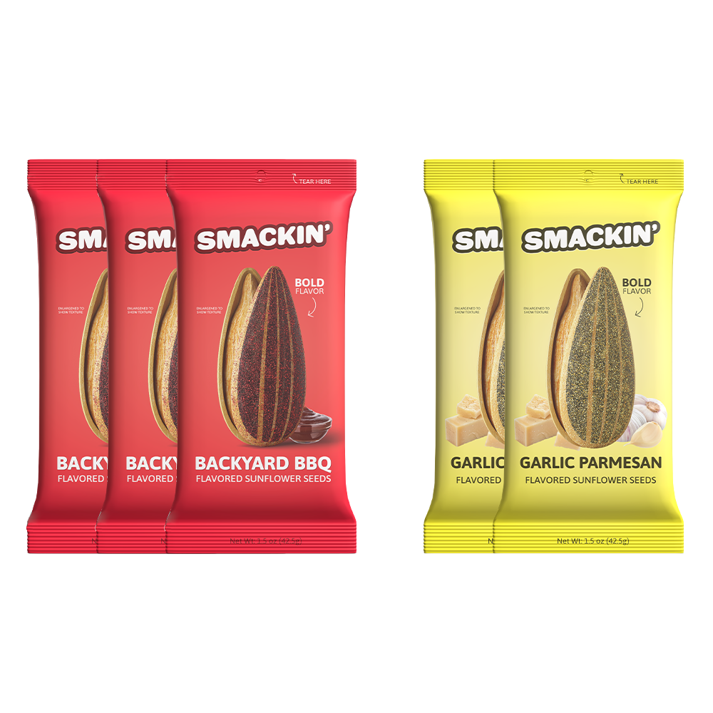 Three red Smackin' Backyard BBQ flavored sunflower seed pouches featuring a dark red seed and barbecue sauce are displayed alongside two yellow Smackin' Garlic Parmesan flavored sunflower seed pouches showcasing a light green seed with cheese blocks and garlic