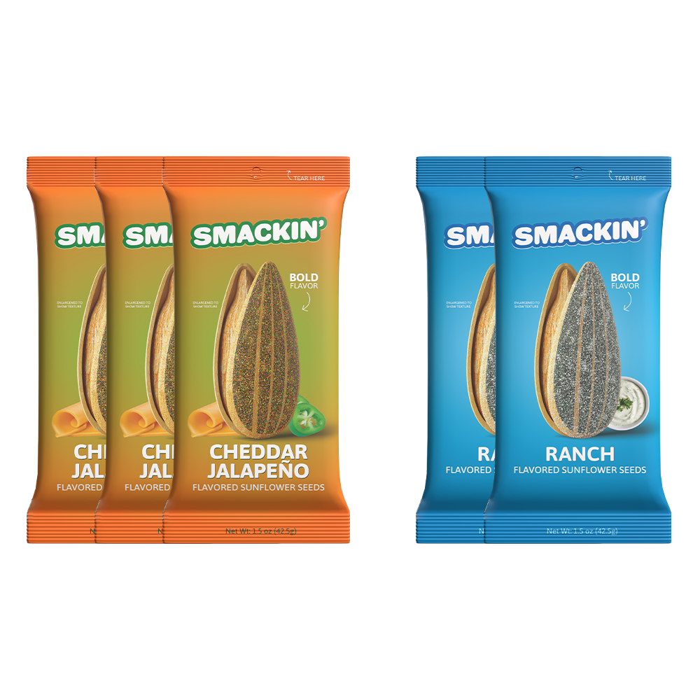 Digital image of Smackin' flavored sunflower seeds packages featuring orange Cheddar Jalapeño with cheese curls and green jalapeño slices and blue Ranch with a white dip bowl all displaying a large sunflower seed and "Bold Flavor" text