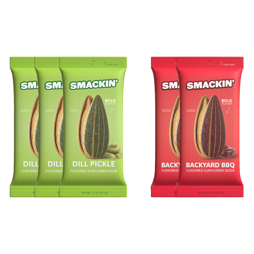 Commercial product photography featuring three green Smackin' Dill Pickle flavored sunflower seed bags showing dill pickles and two red Smackin' Backyard BBQ flavored sunflower seed bags with BBQ sauce, all prominently displaying "Bold Flavor" and distinct speckled sunflower seeds