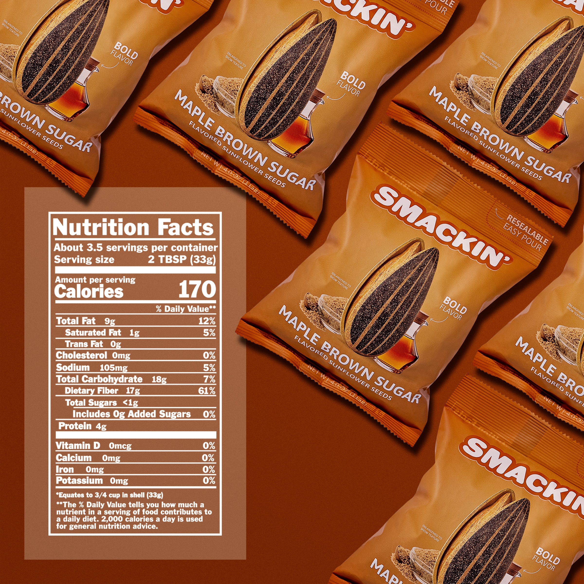 Product photography of multiple Smackin' Maple Brown Sugar Flavored Sunflower Seeds bags on a warm brown surface, showcasing their distinctive brown and orange packaging with an illustrated sunflower seed, maple syrup, and brown sugar, alongside a visible nutrition facts label highlighting 170 calories