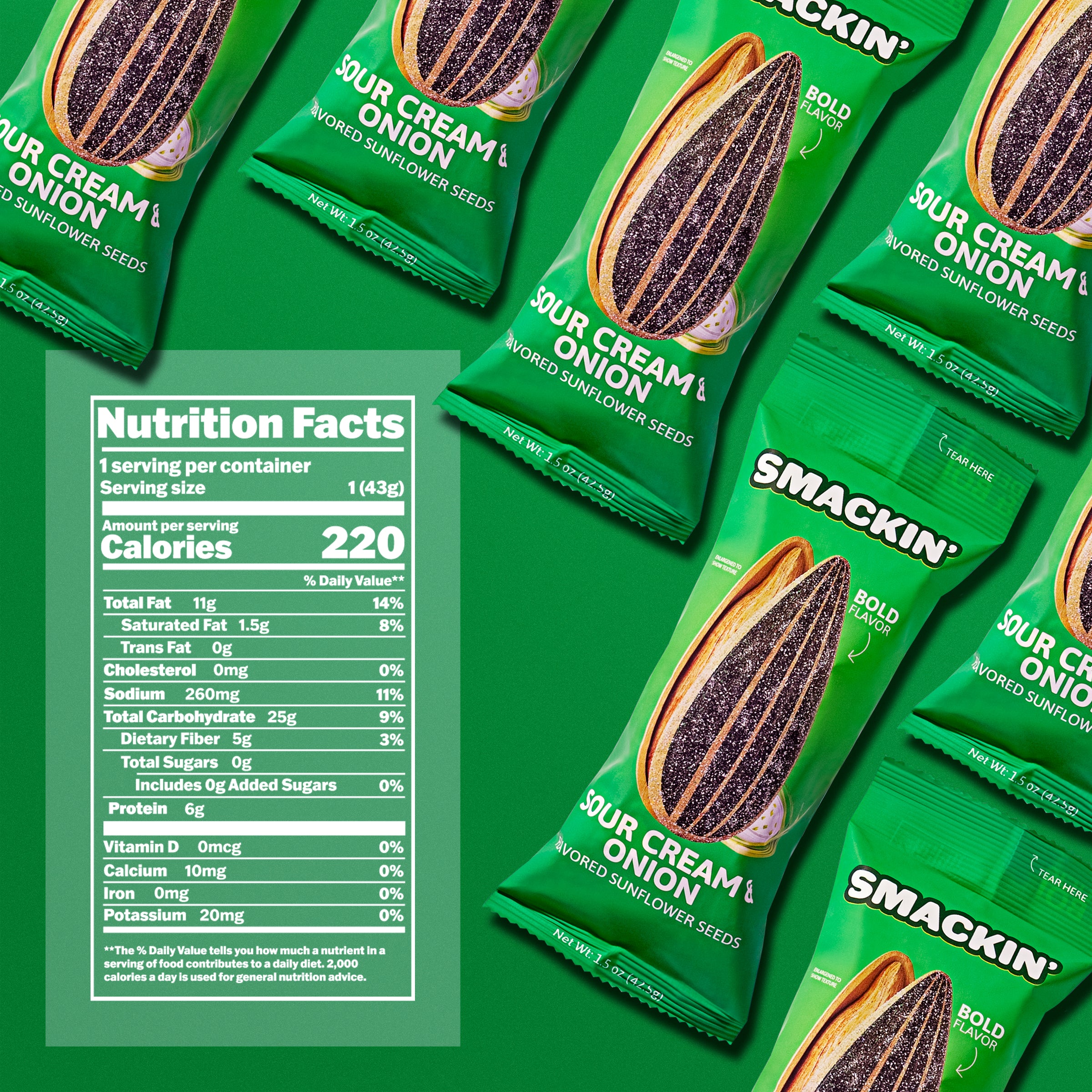 Multiple vibrant green Smackin' Sour Cream & Onion flavored sunflower seeds snack bags are displayed on a matching green background, each featuring a textured graphic of an unshelled sunflower seed and 'Bold Flavor' messaging, alongside a detailed Nutrition Facts label on the left indicating 220 calories and 6g protein